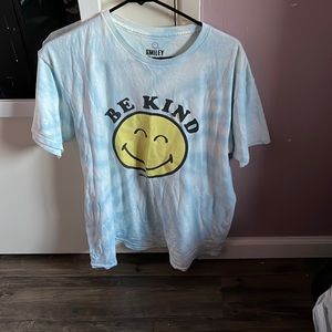 Blue smiley T-shirt that says “be kind”